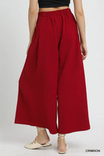 Crimson umgee elastic waist wide leg pants with subtle textured fabric and comfortable elastic waistband