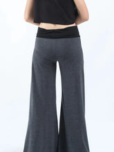 Dark gray high waisted wide leg yoga pants with black elastic contrast waistband for comfortable wear
