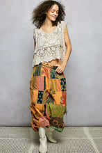 Pol printed patchwork wide leg pants in vibrant orange green and patterned fabrics with adjustable side drawstring ties