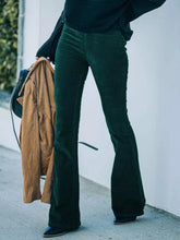 Full size dark green corduroy flare pants in plus size featuring soft textured fabric and stylish flare pants design