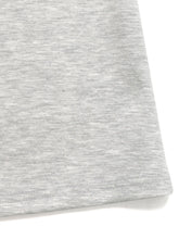 A soft heather gray cotton t-shirt paired with high waisted flare leg pants featuring a subtle textured weave