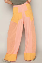Pastel pink and yellow patchwork pol drawstring wide leg pants with mesh panels for breathable comfort