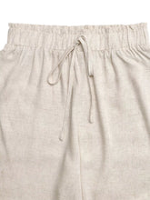 Beige linen wide leg pants with elastic waistband and matching drawstring for casual wear