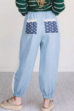 Light blue cotton wide leg joggers with lace accent floral patched pockets and white lace trim