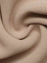 Beige textured knit fabric with a soft woven pattern for smocked waist wide leg pants featuring a smocked waist
