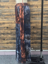 Full size tie-dye wide leg casual pants in deep blues grays and rust-orange hues for plus size wear