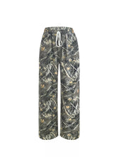 Relaxed fit camo print wide-leg pants with drawstring waist featuring a comfortable lightweight fabric design