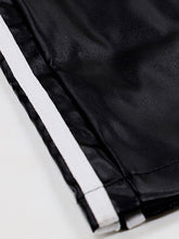 Black satin striped wide-leg pants with a white side stripe designed for comfortable tumble dry wear