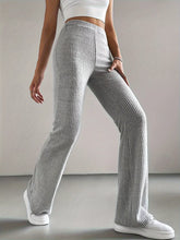 Gray ribbed knit high waist flare pants featuring a comfortable fit and stylish waist flare design