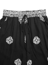 Black wide leg pants with white paisley and geometric embroidery on waistband and legs boho print wide leg pants