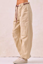 Bi bi drawstring striped twill barrel pants in beige and cream vertical stripes with a muted brown drawstring waistband