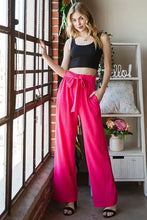 Bright pink heimish full size tie pants with paperbag waistband and matching fabric waist tie plus size offer