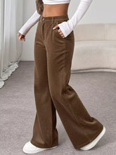 Brown corduroy wide leg casual pants with a relaxed fit and classic button closure for comfortable wear