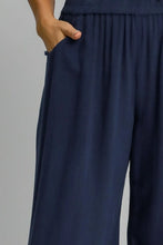 Navy blue umgee full size linen blend wide leg pants with elastic waistband and subtle pleats at the waistband