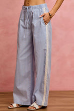 Light blue and white wide check pants with lace trim and piping down the side seam from so me collection