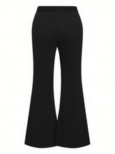 Black ribbed plus size high-waisted flare pants with elastic waistband and wide-leg flared hem for comfortable style