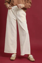 Cream-colored Umgee cable knit textured wide leg pants with woven pattern and elastic drawstring waist