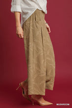 Beige umgee jacquard wide-leg pants featuring subtle leaf embroidery pattern in a comfortable wide-leg design