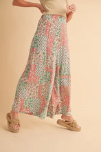 Aemi+co wide leg pants with a flowing patchwork style in soft pink and mint green floral pattern