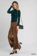 Umgee velvet pleated wide leg pants in brown metallic velvet feature a stylish pleated design for elegant wear
