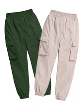 A 2 piece elastic waist cargo pants set in dark green and beige with elastic waistbands and drawstring hems