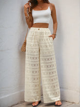 Off-white lace wide leg pants with decorative button wide closure and side pockets for elegant wear