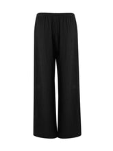 Black tied wide leg pants with elastic waistband in smooth flowing fabric perfect for comfortable wear