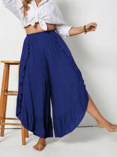 Plus size royal blue ruffled wide leg pants with high waisted flowing design perfect for elegant wear