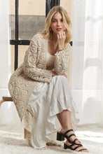 Adora long sleeves maxi dress set with crochet detailing elastic cardigan and cream ruffled hem knit, paired with black sandals
