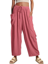 Pink loose-fitting full size wide leg pants with elastic waistband drawstring and pockets plus size wide leg pants
