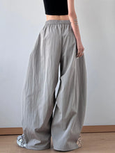 Gray drawstring oversized wide leg casual pants with elastic waistband and relaxed flowing silhouette