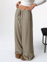 Striped wide leg drawstring pants in brown and white with soft draped fabric for comfortable wear