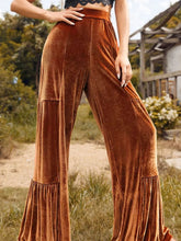 Copper-colored velvet high waist wide leg pants with tiered ruffle hem in a flared design