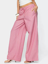 Pink and white striped wide leg pants with a drawstring waistband for comfortable casual wear