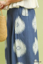 Denim blue umgee abstract border print wide leg pants with white sunburst patterns in border print design