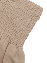 Beige smocked waist wide leg pants with gathered textured waistband made of smocked fabric