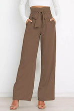 Brown high waist tie front wide leg pants with a tied waistband in a soft fabric for stylish comfort