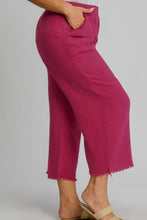 Umgee plus size magenta wide-leg pants with raw hem elastic waist and side pockets in cropped style