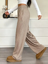 Beige casual drawstring waist wide leg sweatpants with elastic waistband and side pockets for comfortable wear