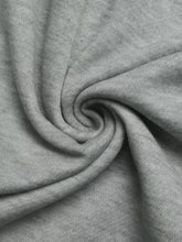 Soft heather gray knit fabric with subtle texture and folds on lace detail wide leg casual pants