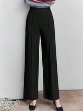 Black high-waisted wide leg pants with a sleek tailored fit ideal for formal and office wear