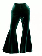 Plus size emerald green velvet flared pants with high waist and flared legs offering stylish velvet flared fit