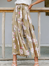 Beige floral wide leg pants with tied waist self-tie waistband and side slits for a stylish look