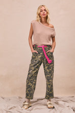 BiBi braided waist belt camouflage print pants with vibrant pink drawstring waistband and relaxed fit patch pockets