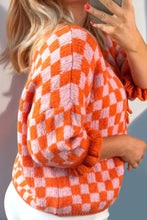 Pink and white checkered blouse with ruffled balloon sleeves