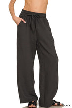 Black zenana woven crepe wide-leg pants with drawstring waist and elastic band in textured woven crepe fabric