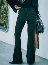 Full size plus size dark green velvet corduroy flare pants featuring a stylish flare pants design