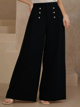 Plus size high waist black wide leg trousers with decorative silver buttons on each side for elegant wear