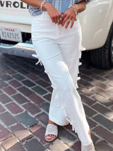 White high-waisted wide-leg pants with bow-accented side ties designed for a perfect fit