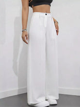 White high-waisted wide leg pants with a minimalist design and a single black front button